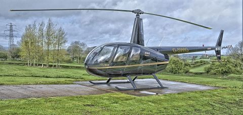 Moderní vrtulník Robinson R44
